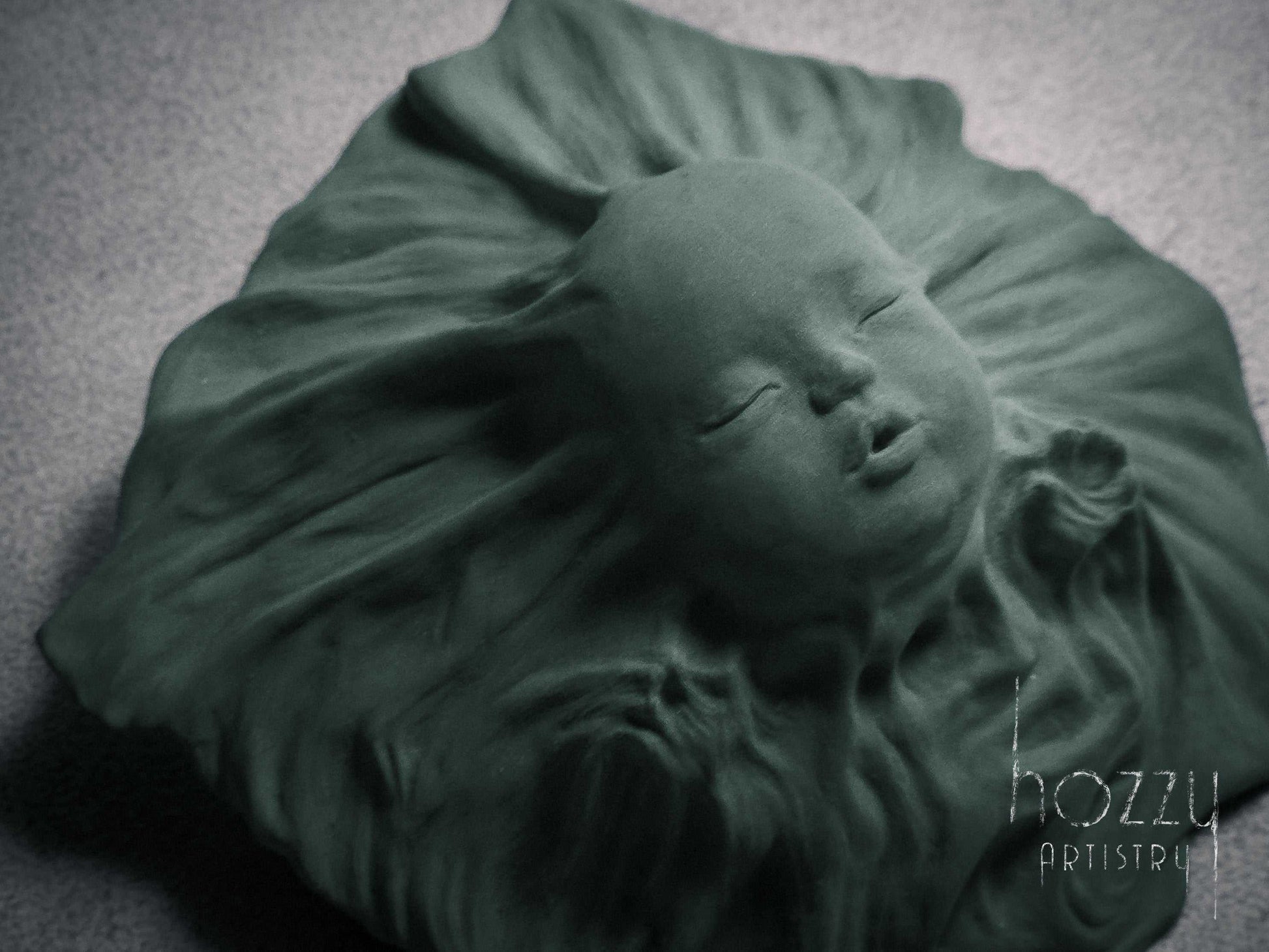 The Veiled BabyThe design takes inspiration from the timeless marble sculpture "The Veiled Virgin" by Italian artist Giovanni Strazza. The sculpture portrays a baby's face with a tHOZZY Artistry StoreHOZZY Artistry Store